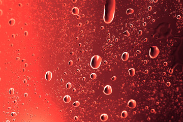 brown water drops on glass