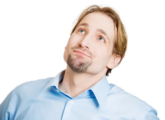 Happy daydreaming young business man