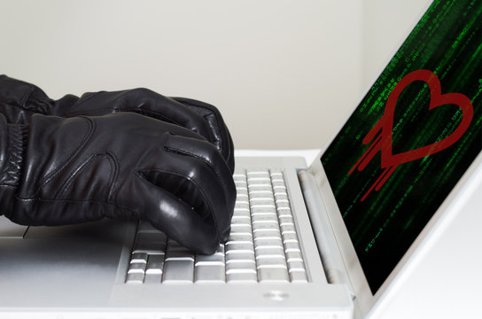 Heartbleed exploit concept with hands wearing black gloves