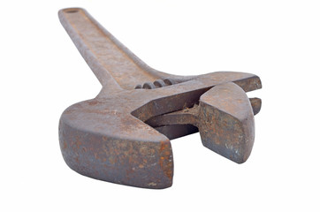 The big metal wrench for untwisting of pipes on a white backgrou