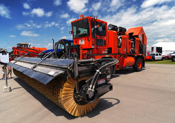 Red airport sweeper