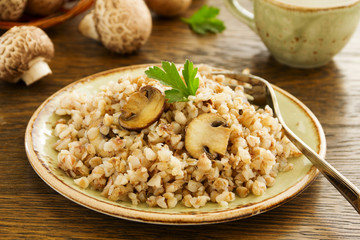 Buckwheat porridge with mushrooms on plate
