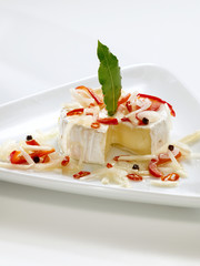 eingelegter Herminlinkaese in Öl