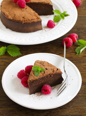 Truffle chocolate cake with raspberries.