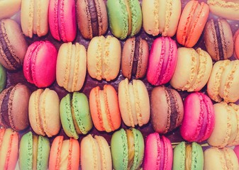 Colourful tasty macaroons in a row