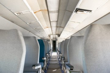 Interior of an airplane with many seats