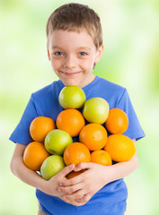 Fototapeta na wymiar Child with apples and oranges