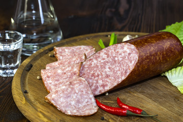 sausage on a wooden plate in a restaurant