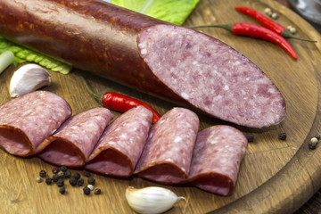 sausage on a wooden plate in a restaurant