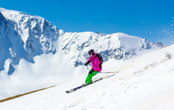 Skier in high mountains