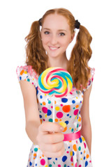 Redhead young girl with lolipops isolated on white