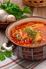 Ukrainian and russian national red soup borsch closeup