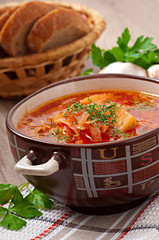 Ukrainian and russian national red soup borsch closeup