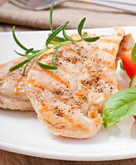 Grilled chicken breasts and vegetables