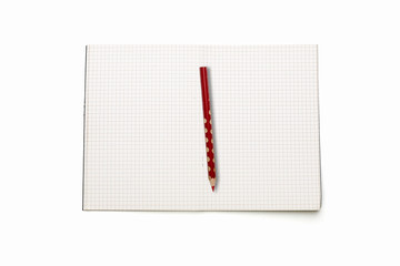 open squared blank book with red pencil, isolated on white