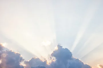 Aluminium Prints Sky sunset burning blue sky with white big cloud and sunrise ray
