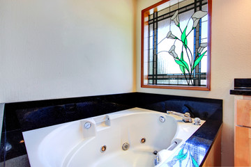 Bathroom with stained glass window