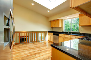 Spacious kitchen room with window in ceiling
