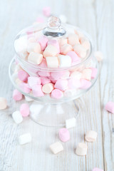 Fototapeta na wymiar marshmallows in beautiful glass dish on a wooden table