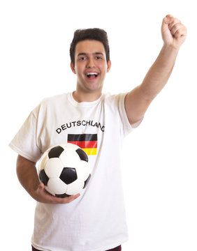 Jubelnder deutscher Fussball Fan mit Ball