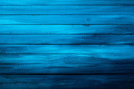 Colorful rich blue wooden background texture