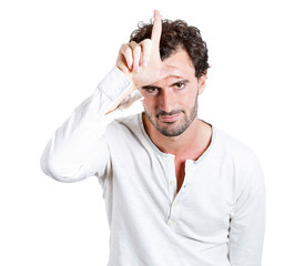 Headshot man showing loser sign isolated on white background 
