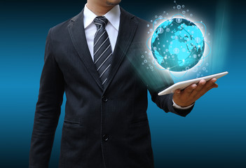 businessman holding tablet world technology and social media