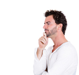 Young man thinking, daydreaming