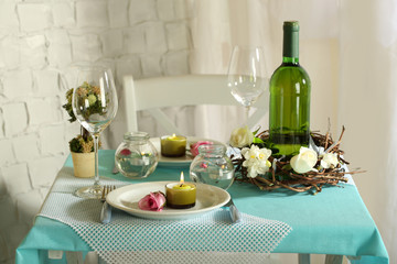 Beautiful holiday Easter table setting in blue tones,