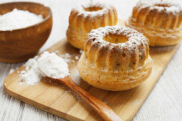 Homemade muffins powdered sugar