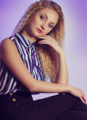 Portrait of beautiful young blonde woman with makeup