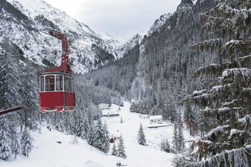 Old gondola ski lift in winter mountain © danmir12