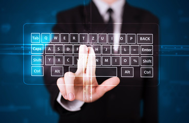 Businessman pressing virtual type of keyboard