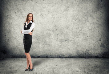 Fototapeta premium Full length portrait of a happy business woman
