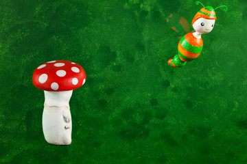 two cute puppets handmade, green background