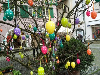 Colorful easter eggs in city