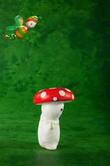 two cute puppets handmade, green background