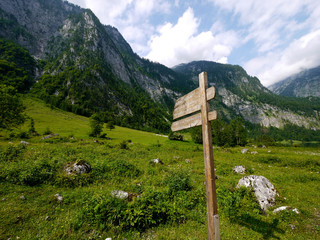 Wooden direction sign at Berchtesgaden national park, Germany