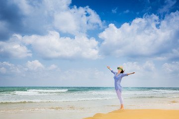 Happy woman at the beach