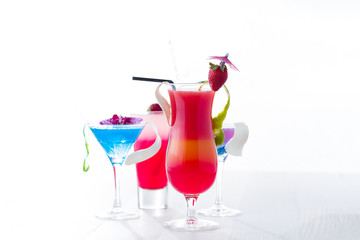 Fresh tropical layered cocktails over white