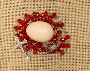 egg and red beads