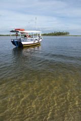 Brazilian Boat Anchored in Shallow Water