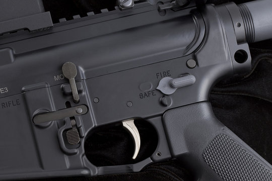 carbine on black - partial view