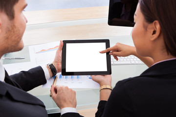 Business Colleagues Using Digital Tablet - Powered by Adobe