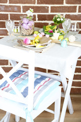 Beautiful holiday Easter table setting, on bright background