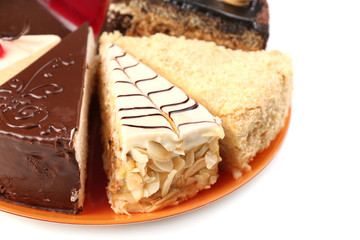 Assortment of pieces of cake, isolated on white © Africa Studio