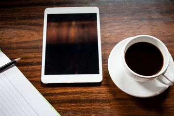 Obraz na płótnie Canvas Tablet with coffee