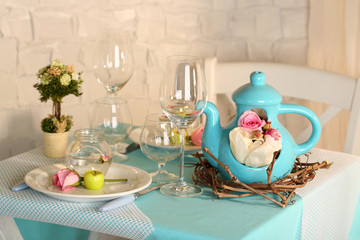 Beautiful holiday Easter table setting in blue tones,