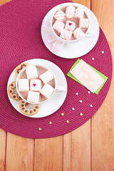 Cups of hot chocolate with marshmallows