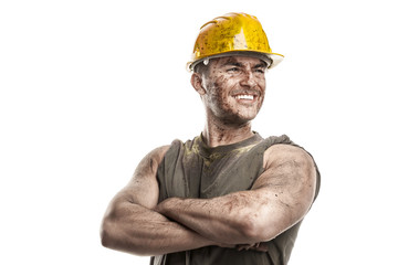 portrait of dirty worker with helmet crossed arms - obrazy, fototapety, plakaty